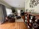 Bright and inviting living room with hardwood floors, cozy seating, and stylish decor at 3970 Norman Rd, Stone Mountain, GA 30083