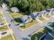 Aerial view of a charming neighborhood with well-manicured lawns and tree-lined streets at 1995 Woodmont Dr, Douglasville, GA 30135