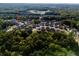 Scenic aerial view of the neighborhood nestled among lush greenery and trees at 1995 Woodmont Dr, Douglasville, GA 30135