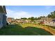 Large grassy backyard with a view of neighboring homes, ideal for Gathering gatherings at 1995 Woodmont Dr, Douglasville, GA 30135