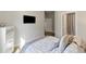 Cozy bedroom with a bed, chest of drawers, and ensuite bathroom access at 1995 Woodmont Dr, Douglasville, GA 30135