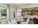 Casual breakfast area with a glass table and comfortable chairs at 1995 Woodmont Dr, Douglasville, GA 30135