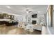Open living space with hardwood floors, fireplace, and large windows at 1995 Woodmont Dr, Douglasville, GA 30135