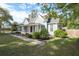 Charming home with a welcoming front porch, mature landscaping, and classic architectural details at 150 E Main St, Rutledge, GA 30663