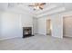 Spacious bedroom with trey ceilings, fireplace, and gray carpet floors at 6462 Beaver Creek Trl, Atlanta, GA 30349