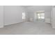 Large, bright bonus room with two windows and plush carpet at 6462 Beaver Creek Trl, Atlanta, GA 30349