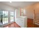 Kitchen with backyard access and white cabinets at 2359 Suwanee Pointe Dr, Lawrenceville, GA 30043