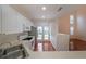 Kitchen with stainless steel appliances and backyard access at 2359 Suwanee Pointe Dr, Lawrenceville, GA 30043