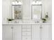 Bathroom featuring double vanity with white cabinetry at 3127 Lenox Road # 6, Atlanta, GA 30324