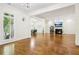 Open floorplan showcasing living room and dining room combo with fireplace and hardwood floors at 3127 Lenox Road # 6, Atlanta, GA 30324