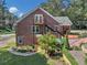 Exterior of home shows a balcony with stairs, covered porch and lush backyard at 133 Hillside Se Ave, Atlanta, GA 30315