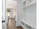 Bright mudroom with built-in bench and storage at 262 Green Hill Rd, Sandy Springs, GA 30342