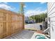 View from backyard, showing wood fence and other homes in the neighborhood at 2688 Toucan Way, Atlanta, GA 30331