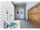 Backyard with gray siding and a view of the wood fence and the door at 2688 Toucan Way, Atlanta, GA 30331