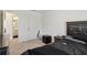 Bedroom featuring carpet, white door and trim and dark-colored furniture at 2688 Toucan Way, Atlanta, GA 30331
