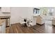 Open dining area featuring a modern table, chairs, and stainless-steel appliances at 2688 Toucan Way, Atlanta, GA 30331