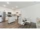 Bright, modern kitchen featuring white cabinets, stainless steel appliances, and an island at 2688 Toucan Way, Atlanta, GA 30331
