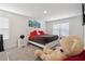 Inviting bedroom with carpet, a king-size bed, and bright natural light at 2688 Toucan Way, Atlanta, GA 30331