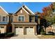 Charming two-story brick home with a two-car garage and well-manicured landscaping at 1957 Brightleaf Way # 59, Marietta, GA 30060