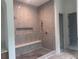 Spa-like shower with modern fixtures and neutral tile at 906 Fairfield Dr, Marietta, GA 30068