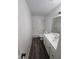 Bathroom with bright white vanity, updated fixtures, and tile shower at 6354 Shannon Pkwy # 12F, Union City, GA 30291