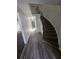 Entryway features wood-look floors and an elegant staircase with iron railings at 6354 Shannon Pkwy # 12F, Union City, GA 30291