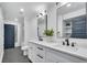 Bright bathroom featuring dual vanities, lots of storage space and black hardware at 2228 Old Dallas Sw Rd, Marietta, GA 30064
