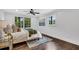 Bright bedroom with hardwood floors, a ceiling fan, and natural light at 2228 Old Dallas Sw Rd, Marietta, GA 30064