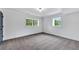Spacious bedroom with carpet and large windows at 2228 Old Dallas Sw Rd, Marietta, GA 30064