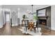 Dining room with brick fireplace and wood burning insert at 2228 Old Dallas Sw Rd, Marietta, GA 30064