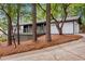 Charming home with a painted brick foundation, nice landscaping, and covered front porch at 2228 Old Dallas Sw Rd, Marietta, GA 30064