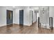 Upstairs hallway with natural light and wooden floors at 2228 Old Dallas Sw Rd, Marietta, GA 30064