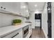 Bright kitchen with white cabinets, stainless steel appliances and ample counter space at 2228 Old Dallas Sw Rd, Marietta, GA 30064