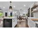 Open concept kitchen with center island and adjacent dining area at 2228 Old Dallas Sw Rd, Marietta, GA 30064
