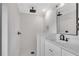 Contemporary shower featuring white subway tile, modern fixtures, and a frameless glass door at 2228 Old Dallas Sw Rd, Marietta, GA 30064