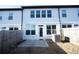 Private backyard with a patio and wooden fence at 94 S Auburn Landing Pl, Auburn, GA 30011