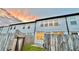Backyard with wooden fence, patio, and a view of the sunset at 94 S Auburn Landing Pl, Auburn, GA 30011