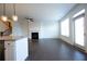 Spacious living room with hardwood floors, fireplace and sliding glass doors at 94 S Auburn Landing Pl, Auburn, GA 30011