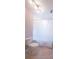 Clean bathroom with white toilet and shower at 3423 Glen Rd, Decatur, GA 30032