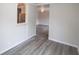 Open concept dining area with hardwood floors and living room view at 3423 Glen Rd, Decatur, GA 30032