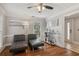 Stylish living room with hardwood floors, designer furniture, and modern décor at 1210 Swan Mill Ct, Suwanee, GA 30024