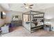 Spacious main bedroom featuring a vaulted ceiling, a ceiling fan and carpeted floors at 1210 Swan Mill Ct, Suwanee, GA 30024