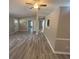 Spacious living room showcasing hardwood floors, natural light, and open layout at 32 Sherwood Loop, Mcdonough, GA 30253