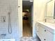 Bathroom showcasing modern sink, stylish tile work, and high-end finishes at 246 Plantation Sw Rd, Smyrna, GA 30082