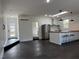 Kitchen featuring modern stainless steel appliances, hardwood floors, and a skylight at 246 Plantation Sw Rd, Smyrna, GA 30082