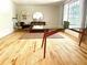Bright living room with hardwood floors, modern furniture, and ample natural light at 246 Plantation Sw Rd, Smyrna, GA 30082