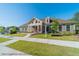 Community clubhouse featuring manicured lawn and elegant facade at 3587 Fishpond Cir, Dacula, GA 30019