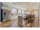 Modern kitchen with stainless steel appliances, ample counter space, and stylish pendant lighting at 3587 Fishpond Cir, Dacula, GA 30019