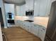 Modern kitchen featuring stainless steel appliances and ample cabinetry at 3587 Fishpond Cir, Dacula, GA 30019