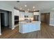 Spacious kitchen featuring a large island, stainless appliances, and white cabinets at 3587 Fishpond Cir, Dacula, GA 30019